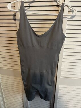 Pink active romper NWT size xs